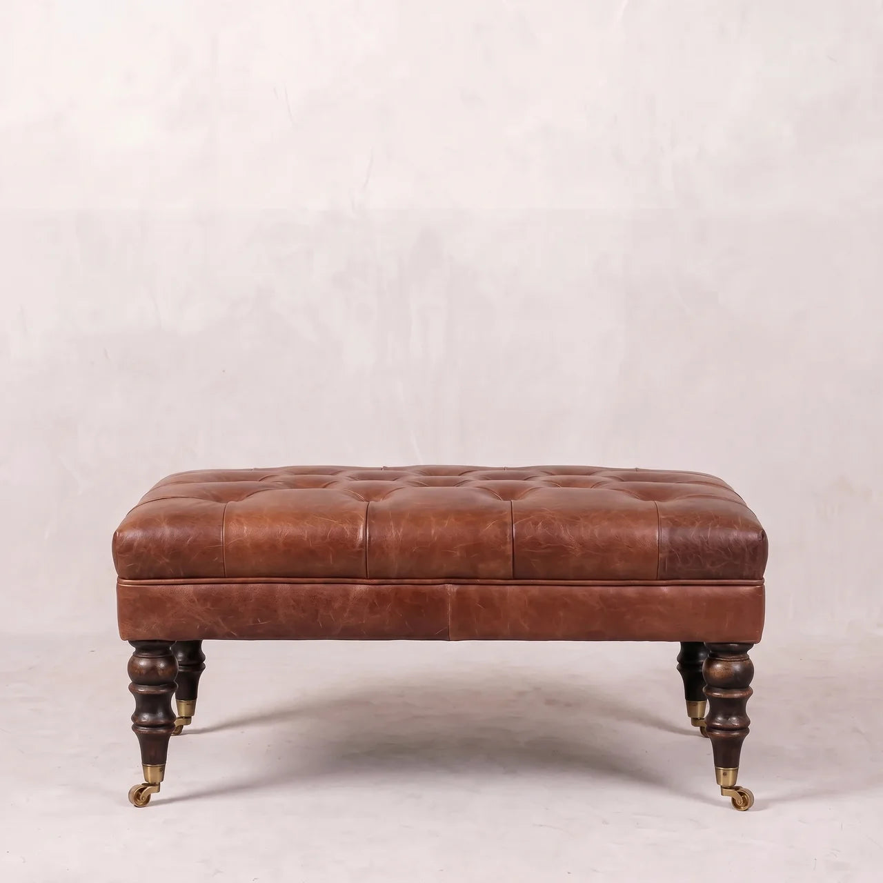 Buffalo Brown Leather Ottoman with Castor Legs