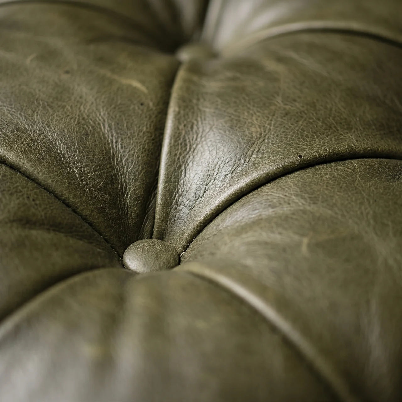 Buffalo Green Leather Ottoman with Castor Legs