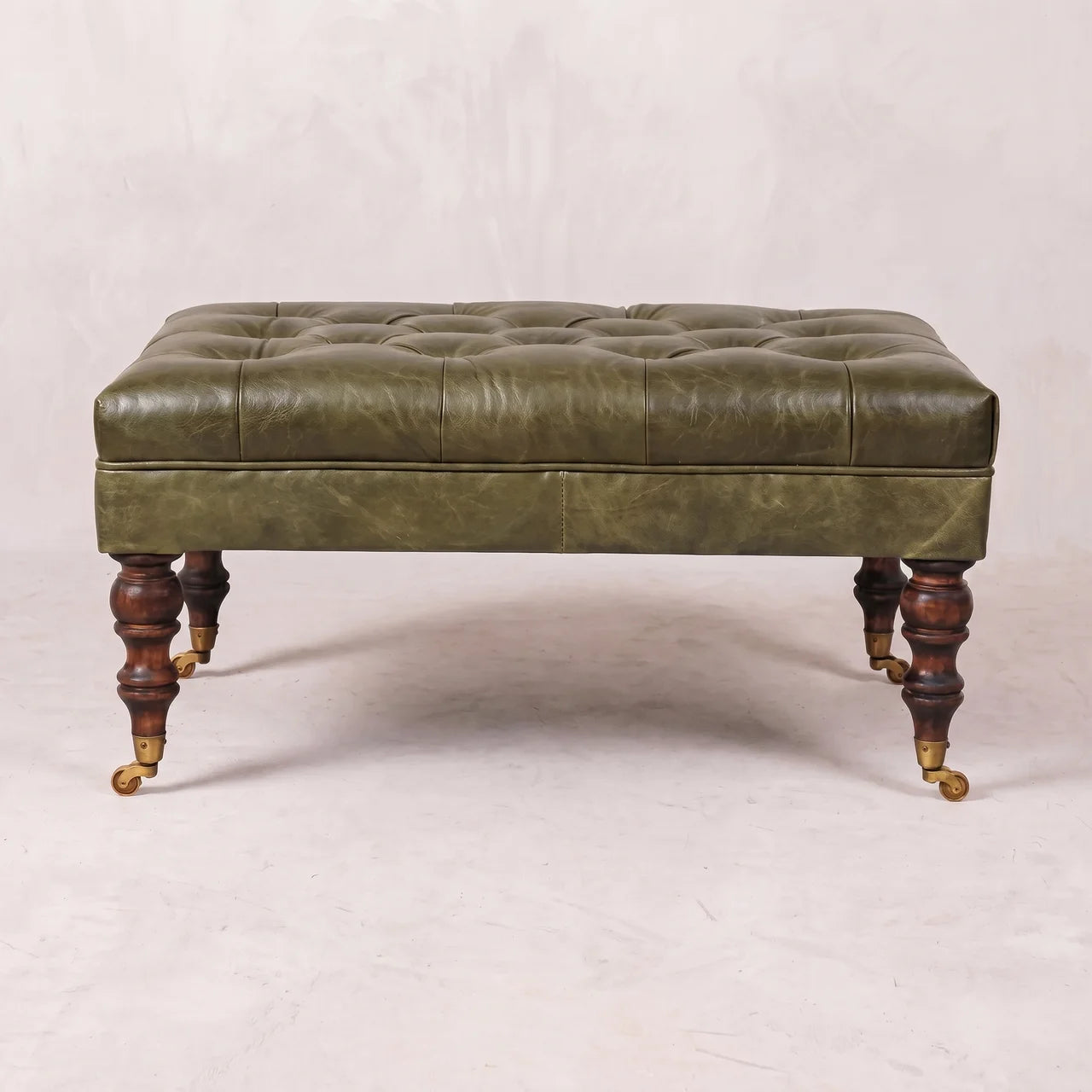 Buffalo Green Leather Ottoman with Castor Legs